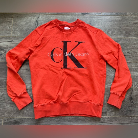 Calvin Klein Jeans Tops - Calvin Klein orange crew neck logo terrycloth sweatshirt
